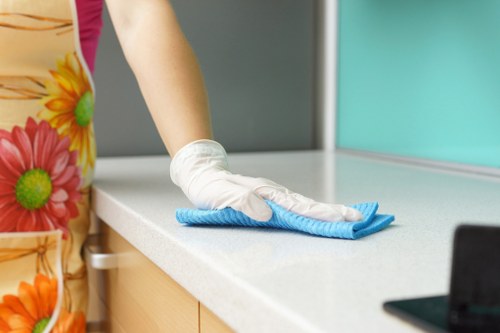 Cleaner in Paddington preparing a safe cleaning job with protective equipment